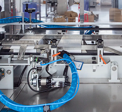 Готовая автоматизированная линия для упаковки продукции в картонные коробки: производительность до 10 коробок/мин-4